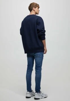 PULL & BEAR Ripped - Slim Fit Jeans - Dark Blue 9 PULL & BEAR Ripped - Slim Fit Jeans - Dark Blue -Jack and Jones Verkoopwinkel e9888dfcf69345c4b7ab0c90cbc7b566