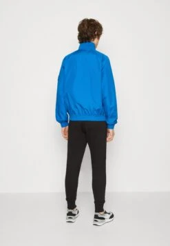 Calvin Klein Jeans Unpadded Harrington Jacket - Regenjas - Tarps Blue -Jack and Jones Verkoopwinkel f85390ba206b44a384913913cd2ecb17